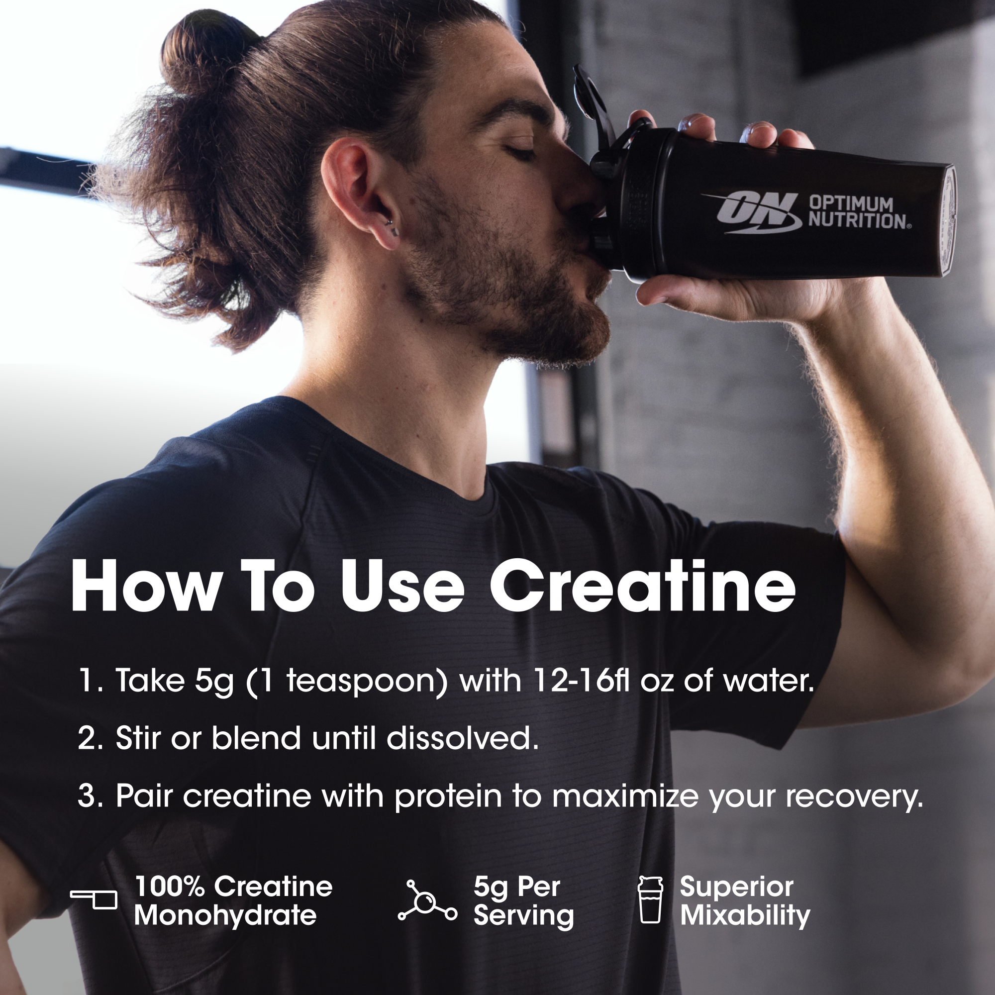 Man drinking from an Optimum Nutrition creatine supplement container with usage instructions.
