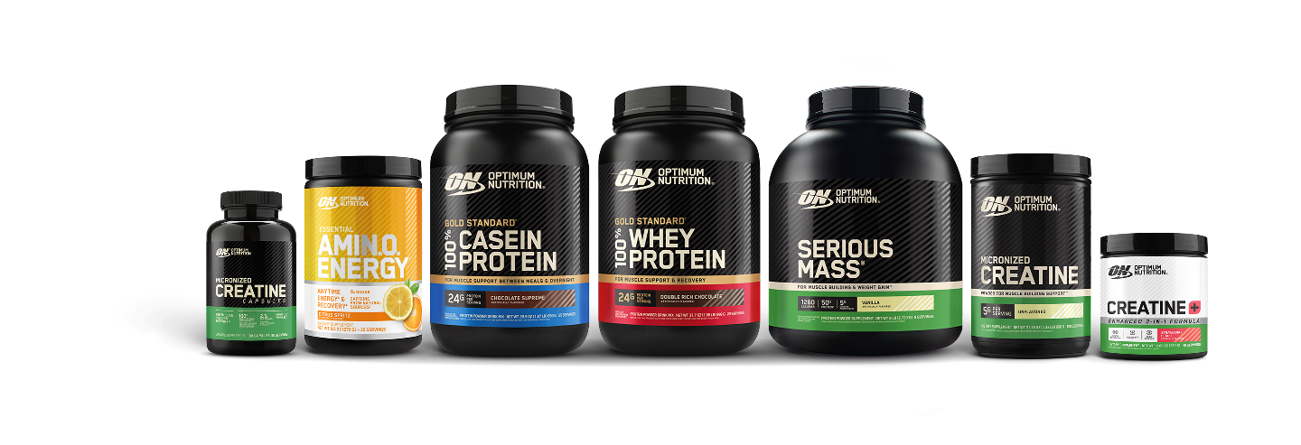 Collection of Optimum Nutrition protein powder containers on a white background